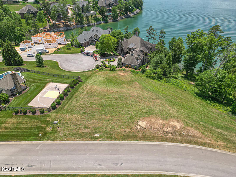 This image portrays 16135 Lighthouse Pointe Drive by WindRiver Lakefront & Golf Community.