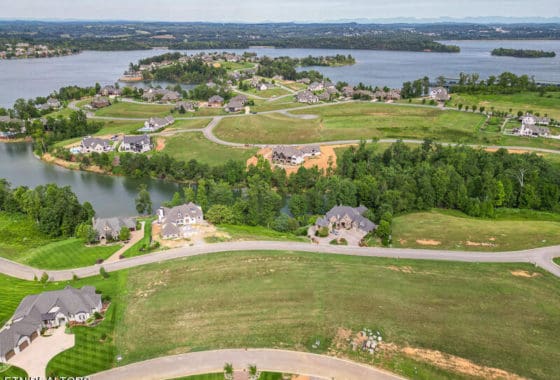 This image portrays 470 Commodore Drive by WindRiver Lakefront & Golf Community.