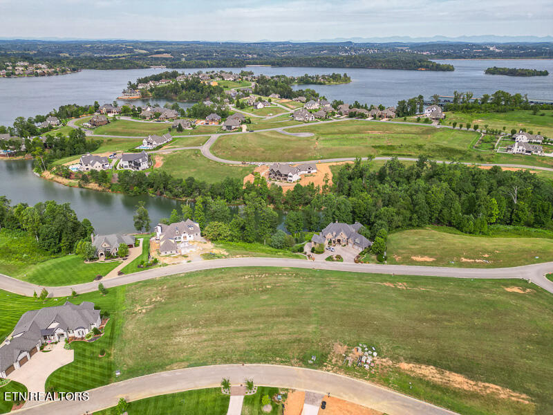 This image portrays 470 Commodore Drive by WindRiver Lakefront & Golf Community.