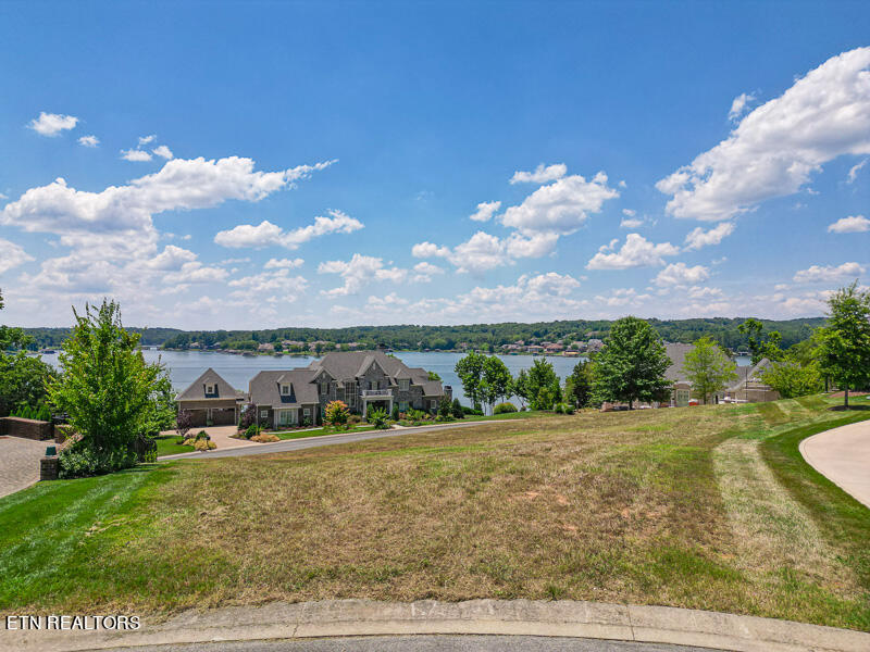 This image portrays 1285 Castaway Lane by WindRiver Lakefront & Golf Community.